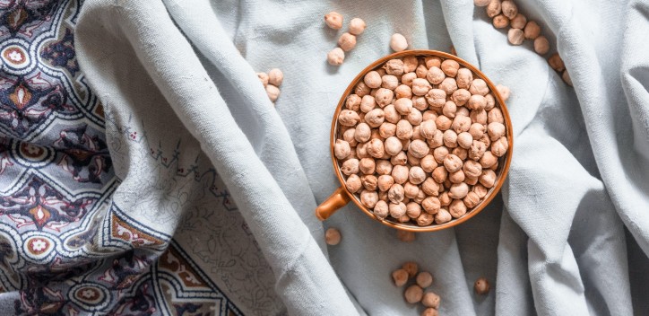 image of dried chickpeas in a bowl against a cloth