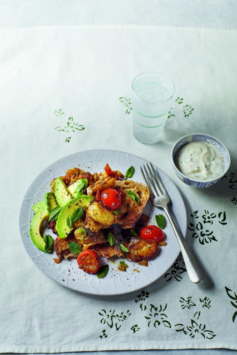 Indian-spiced potatoes and raita on toast by Fearne Cotton against a white cloth background