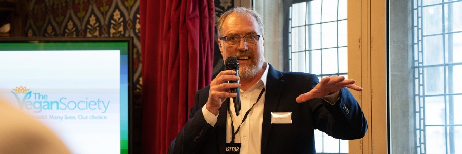 Photograph of Vegan Society CEO, Steve Hamon delivering a talk