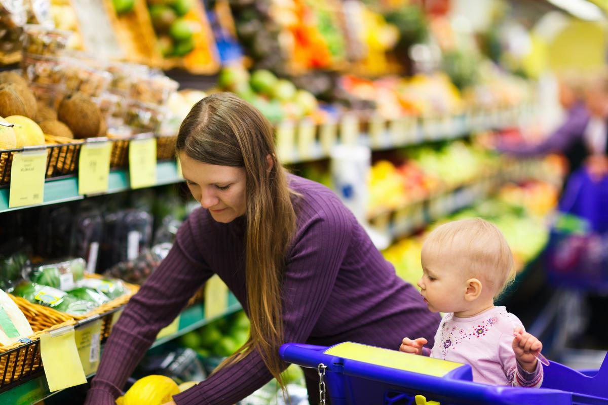 Woman and baby in supermarket