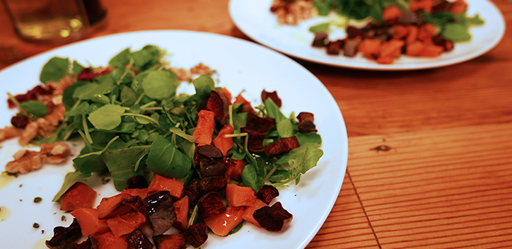 Squash and beetroot with cranberry and walnut on a herby watercress salad | The Vegan Society