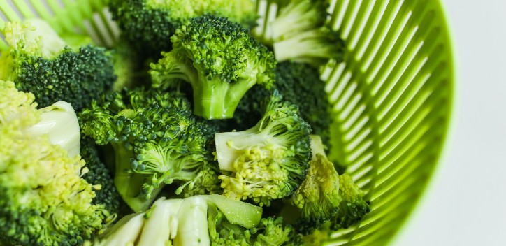 A colander filled with florets of broccoli.  Photo by Polina Tankilevitch from Pexels