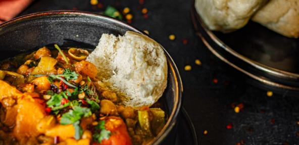 Bambara Bean and cowpea stew served with Dombolo (South African steam bread) 