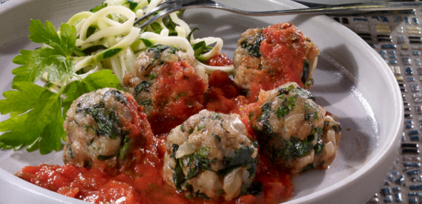  A shallow bowl filled with canederli (Italian dumplings)