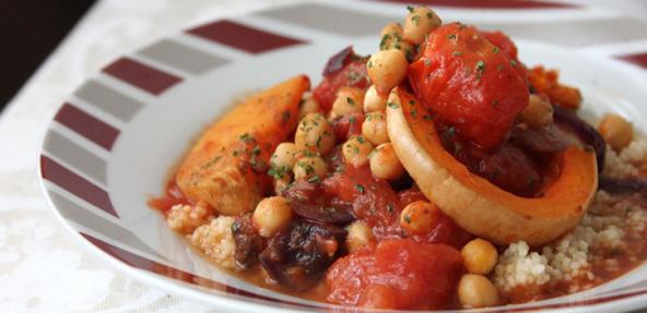 Chickpea butternut tagine served in a shallow decorative plate
