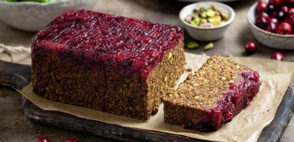 Pistachio Cranberry Nut Roast surrounded by ingredients 