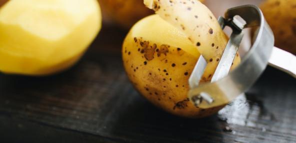 Potato being peeled