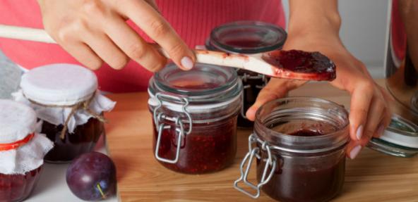 Person preparing jam