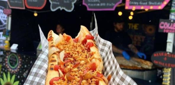 A close up image of a vegan hot dog at a food stand