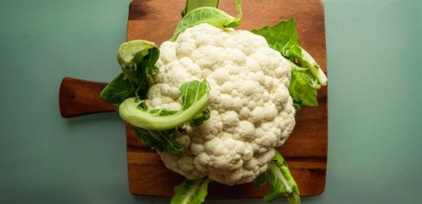 image of cauliflower on a chopping board