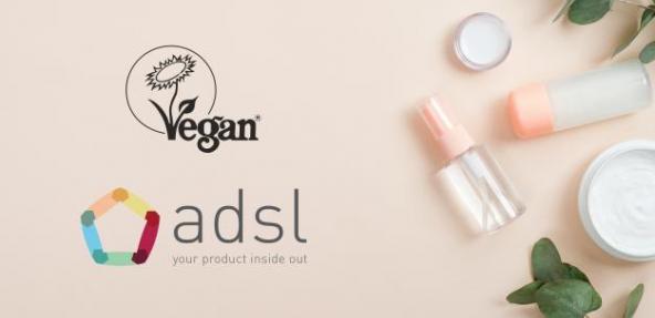 ADSL logo and Vegan Trademark logo with cosmetic products