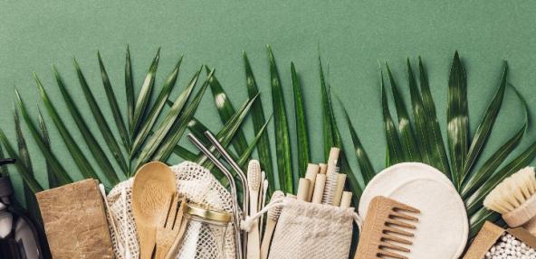 assorted eco friendly goods against a background of leaves