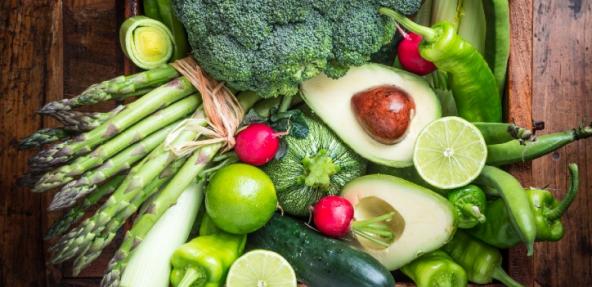 Fresh greens and tomatoes shot from above