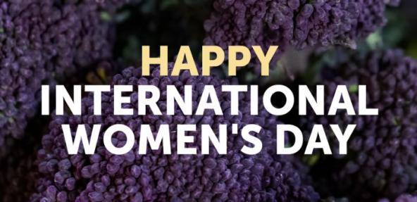 Text: Happy International Women's Day. Background image is a close up of purple broccoli.
