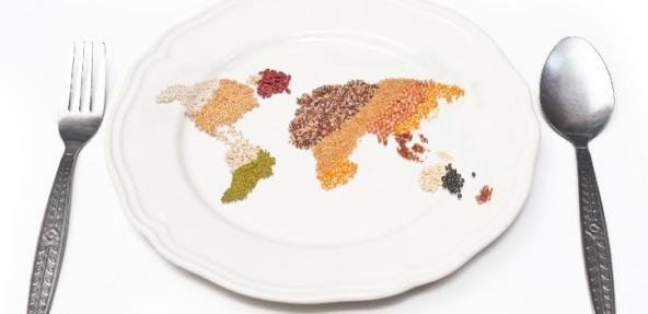 Map of the world made from grains and pulses on a plate