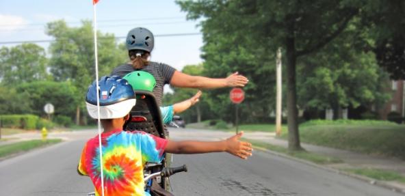 Two people cycling