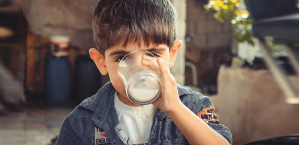 child drinking milk