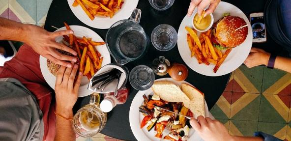 people at a restaurant eating food