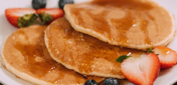 stack of pancakes with berries