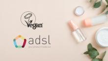 ADSL logo and Vegan Trademark logo with cosmetic products