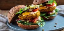 Butternut squash and chickpeas burger with tomato salsa, spinach, roast courgettes and avocado