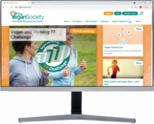 Computer screen with Vegan Society on screen