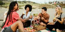Friends having a picnic at the beach