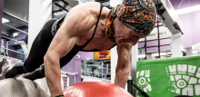 63 year old vegan doing a push up at the gym