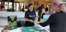 Evie, Community Network volunteer, handing out leaflets at events