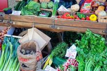 Wooden market stall with fruit and vegetables 