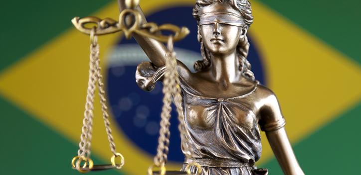 symbol of law and justice with Brazilian flag