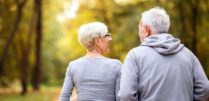 Mature couple jogging in the park