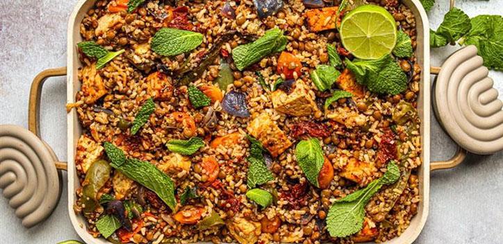 Crispy tempeh with mixed grain and lentil traybake