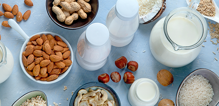 variety of plant milks laid out