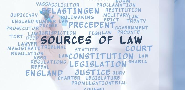 sources of law text being written on a board