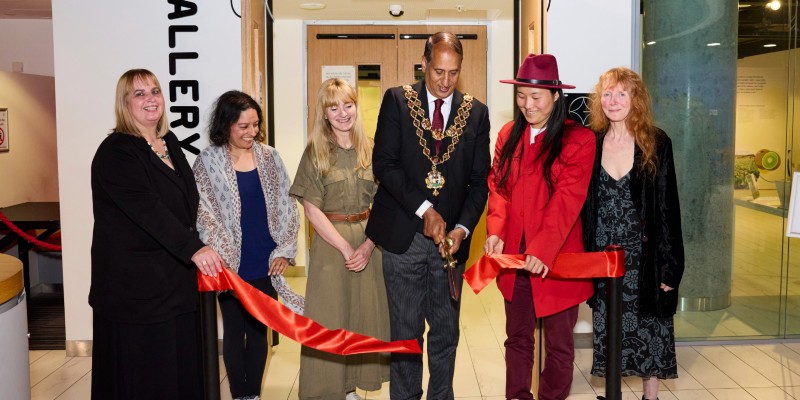 The Lord Mayor of Birmingham, Zafar Iqbal MBE, opening The Vegan Society's 80th anniversary exhibition, alongside (L-R): Dr Sam Calvert (Vegan Society Head of Communications and Fundraising); Harjeet Kaur (exhibition organiser); Libby Peppiatt (Vegan Society CEO): Qian Zephaniah (widow of Benjamin Zephaniah); Jenifer Vinell (Chair of The Vegan Society's Council of Trustees).