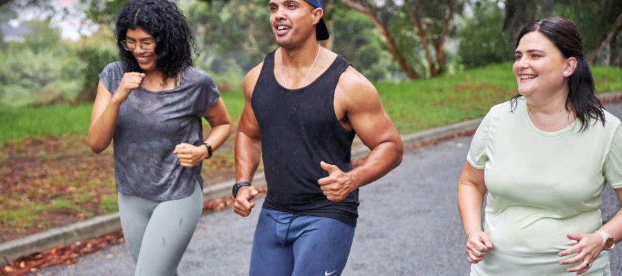 Group of friends running outdoors