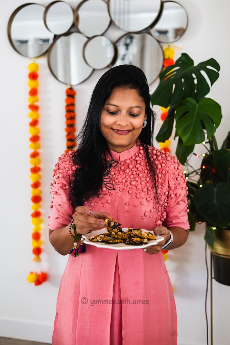 Yumee with Amee holding a plate of Chocolate Mithai Bark