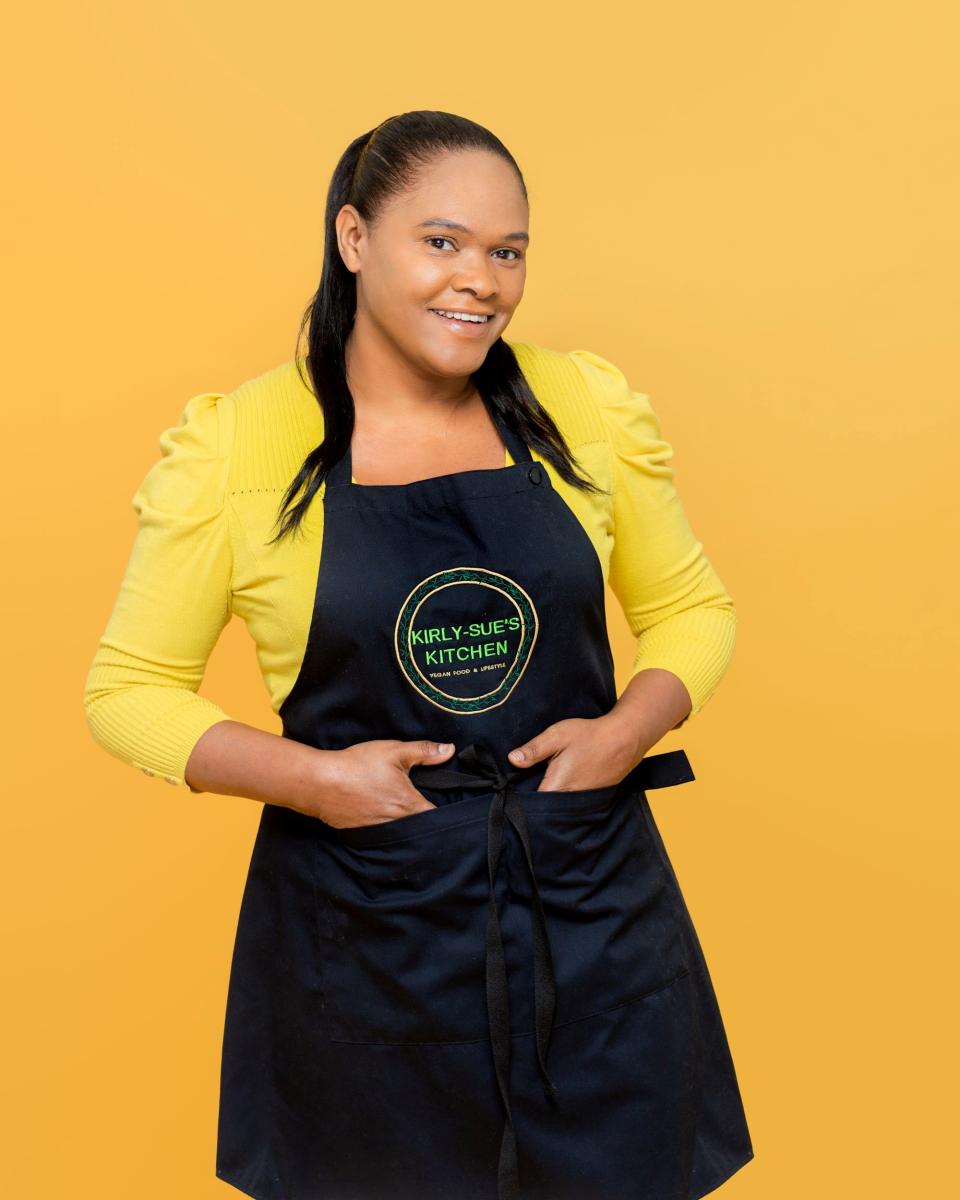 Susanne Kirlew wearing Kirly-Sue's kitchen apron