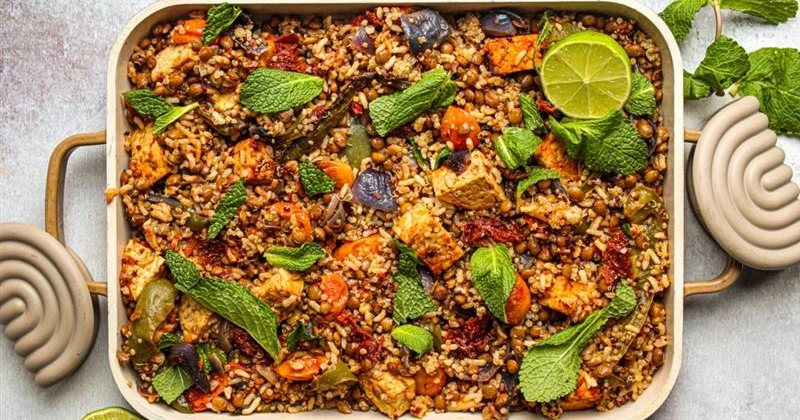 Crispy tempeh with mixed grain and lentil traybake