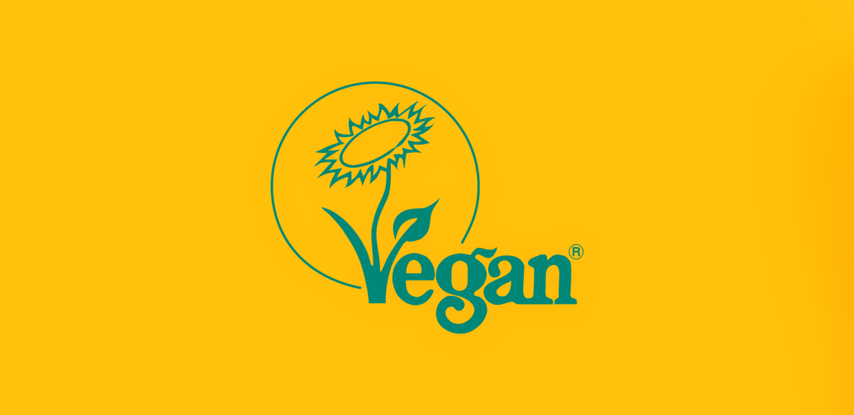The Vegan Trademark in green on a yellow background