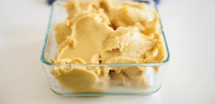 banana ice cream in a clear tray