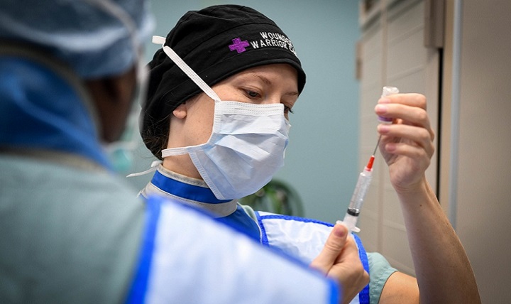 Doctor with needle