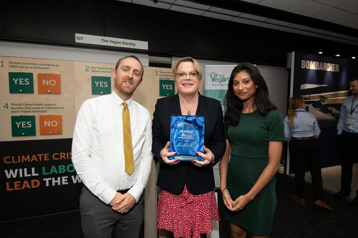 Winning the best exhibition stand award at the Labour Party Conference, presented by Eddie Izzard