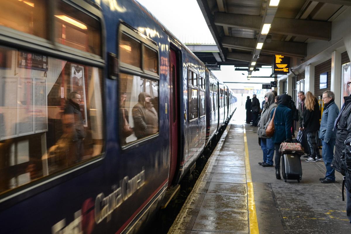 People waiting on train platform