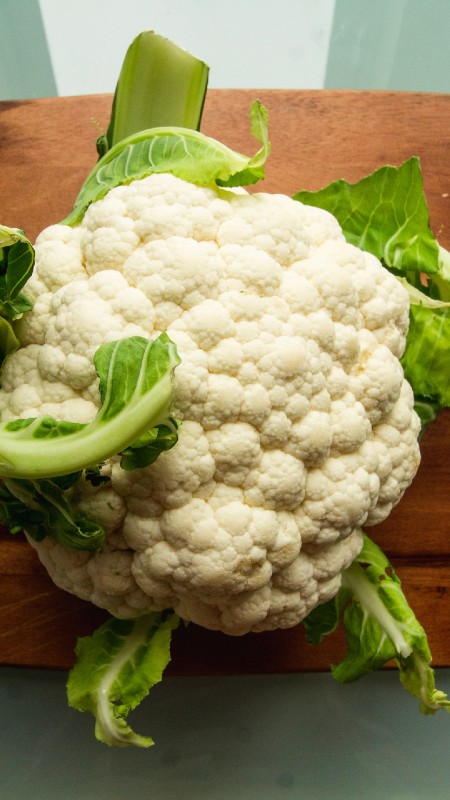 image of cauliflower on a chopping board