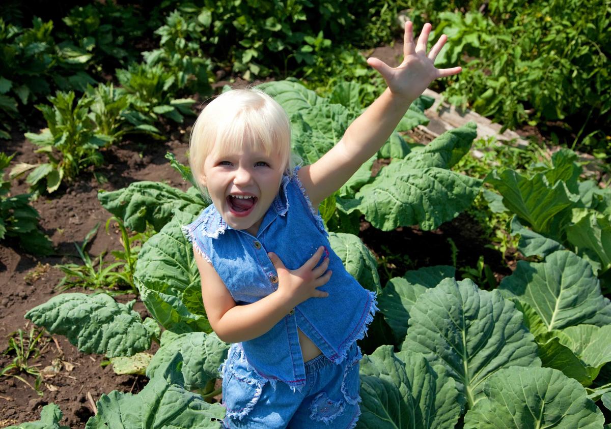 Child in veg patch