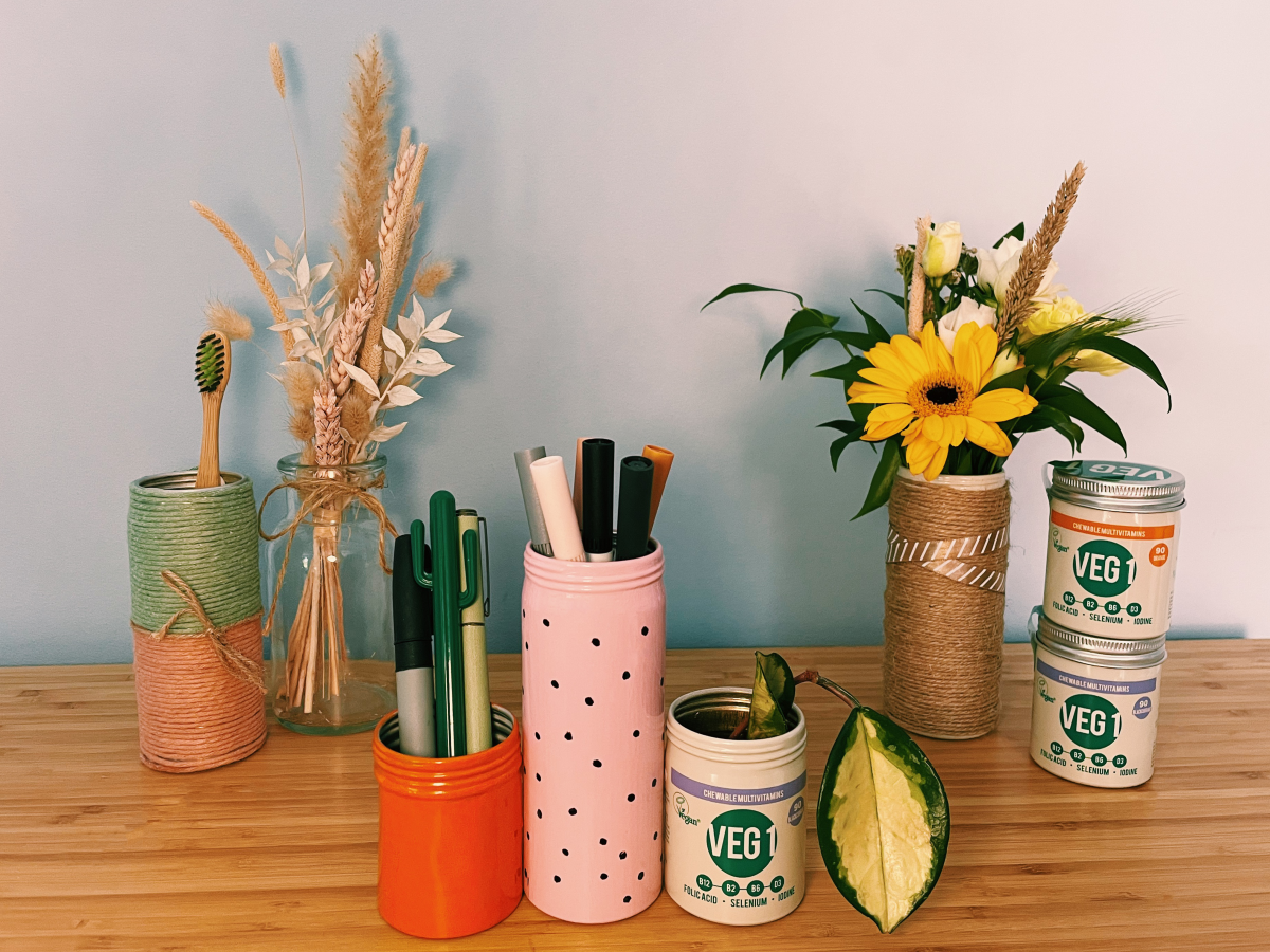 Repurposed VEG 1 pots used for plants, pens, flowers and a toothbrush