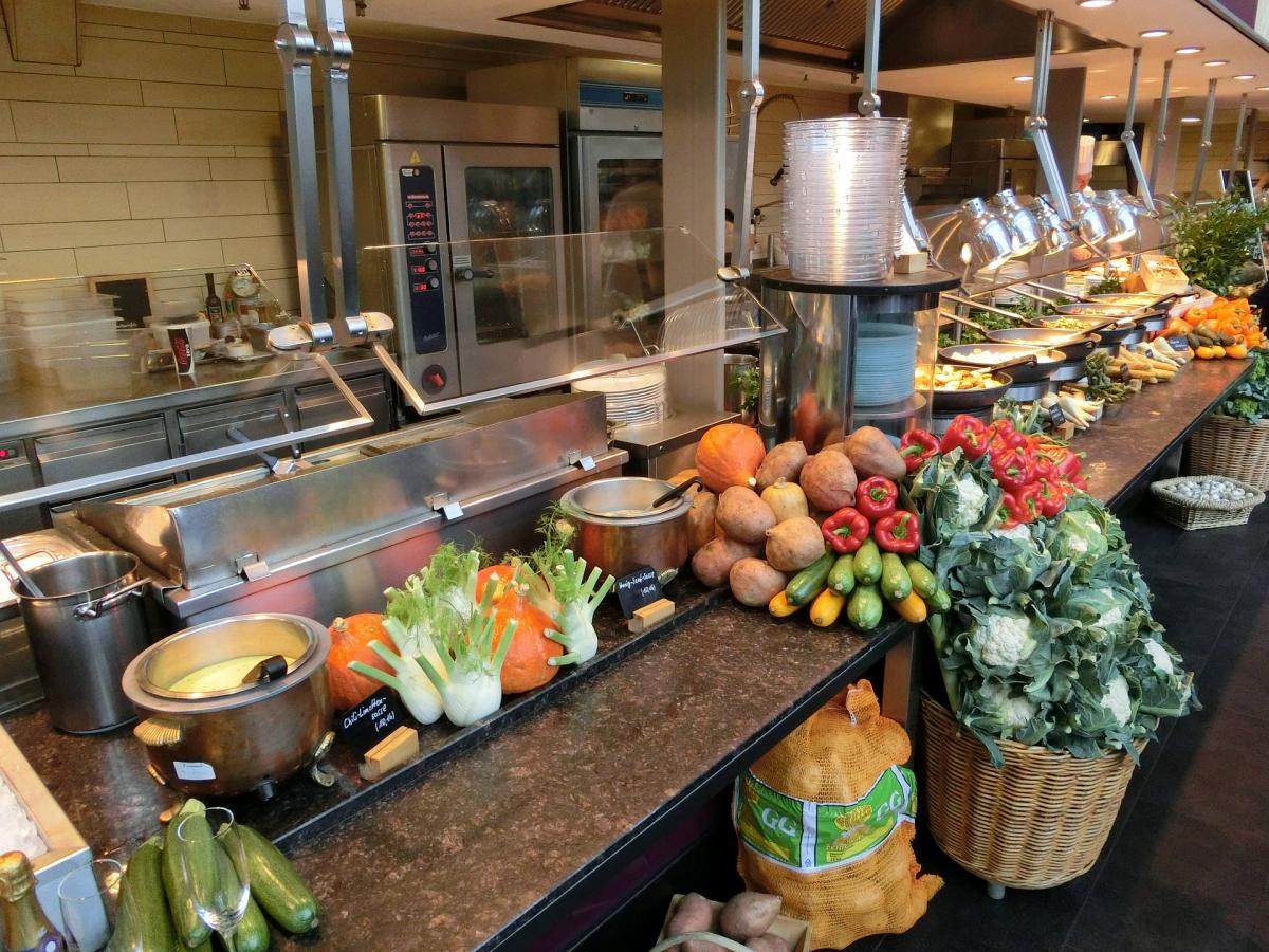 commercial kitchen area with a variety of vegetables