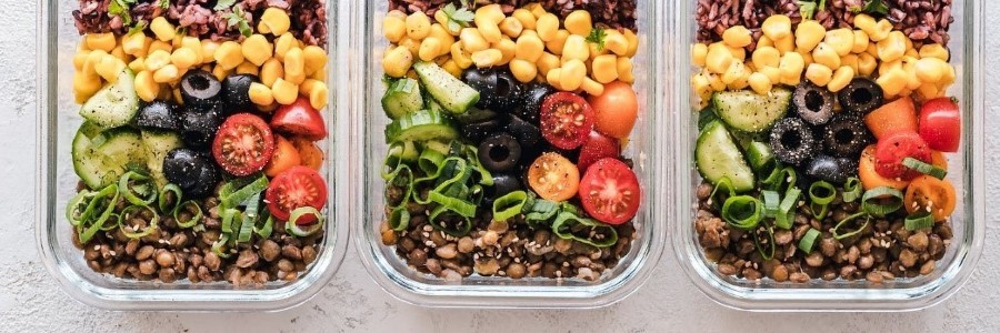 photo of three meal prep containers with vegetables